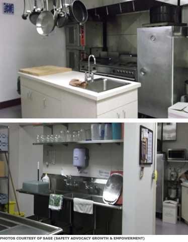 A commercial kitchen with large workspaces and durable appliances.