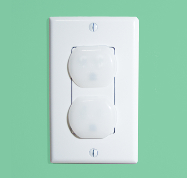 A wall socket with caps to prevent children from injuring themselves.